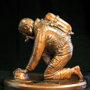 Kneeling Firefighter Statue